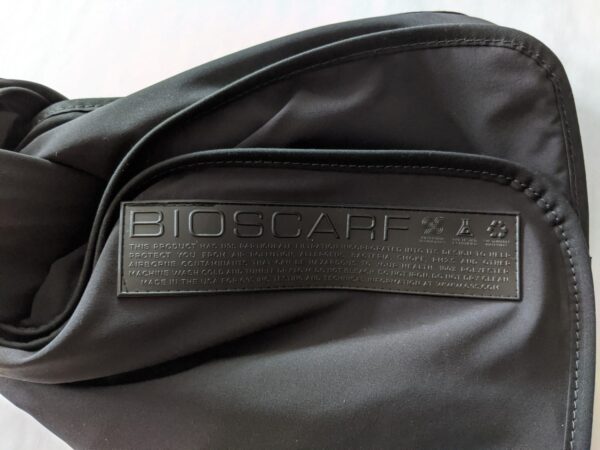 Close up of eco friendly, recycled black Bioscarf instead of a face mask