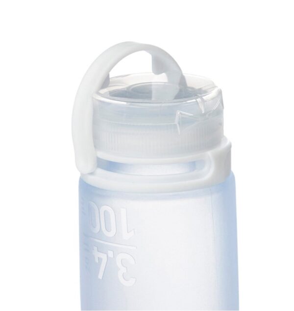 Close up of loop cap top of GoToob silicone toiletry bottle for sustainable travel packing list.