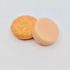 Pink Maverick brand zero waste solid shampoo and conditioner bars in tangerine and lemon scent
