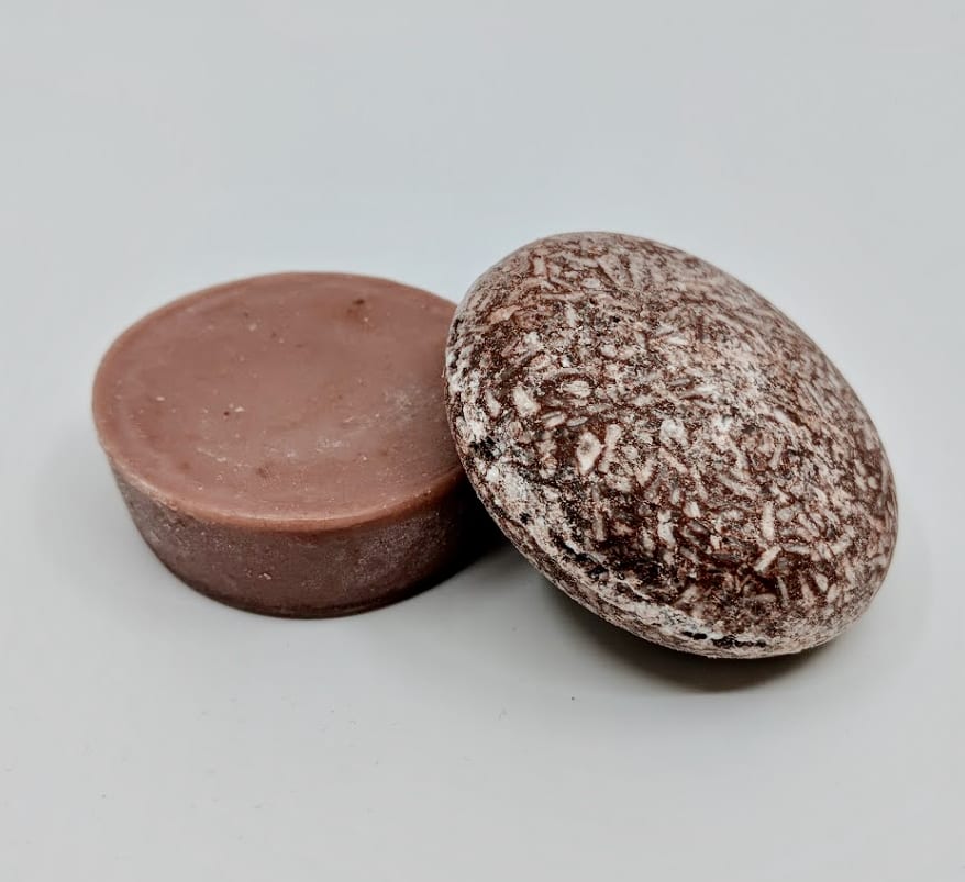 Pink Maverick brand Moroccan Argan oil solid shampoo and conditioner bars.