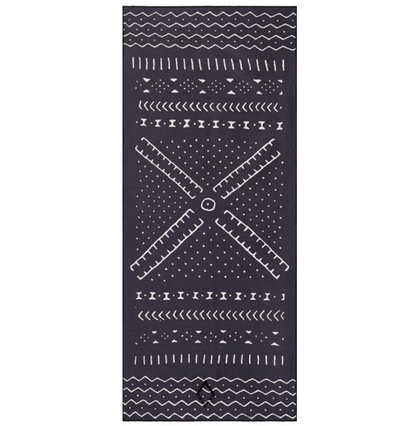 Product display of sustainable Nomadix brand, Mud Cloth pattern, recycled quick drying beach and yoga towel.