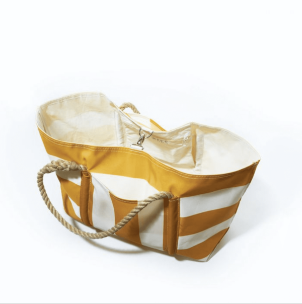 Sea Bags brand large beach tote with white and yellow stripes; shows top clasp closed and secured