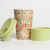 Environmentally friendly E-Coffee Cup brand bamboo fibre coffee cup Papafranco 12 ounce reusable plastic free on the go coffee cup displayed with lid off and hot sleeve next to cup.