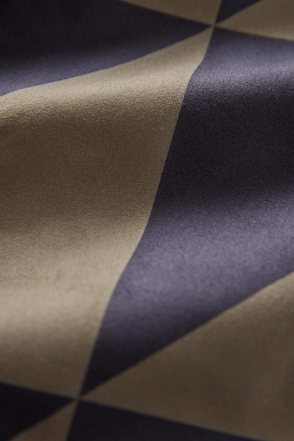 Close up of sustainable, recycled festival blanket in Sierra Black Brown from Nomadix