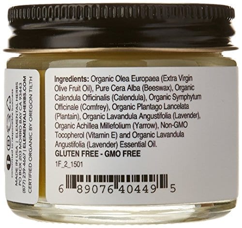 Close up display of glass container with ingredients printed on label for All Good Products brand hand crafted organic healing balm.