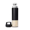 Welly brand black bamboo and stainless insulated traveler bottle with removable infuser hovering above open bottle with the white loop cap resting next to traveler bottle.