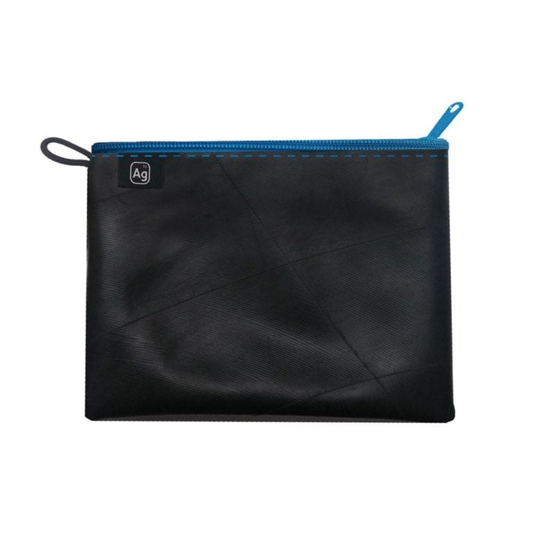 Large zipper pouch from Alchemy Goods is water resistant and made from upcycled inner tubes; shown in black with blue zipper.