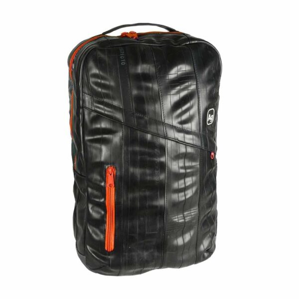 Alchemy Goods backpack in black made from recycled and durable materials; shown with orange zippered accents.