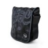 Small shoulder bag by Alchemy Goods made from upcycled bicycle inner tubes; side view to show adjustable shoulder strap.