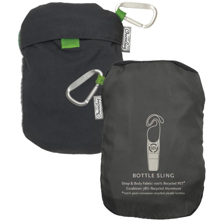 Product display of two eco friendly Chico Bag brand bottle sling bags in a folded up positions to show the minimalist size featuring a small silver carabiner on each and quick facts on the back side of pouch.
