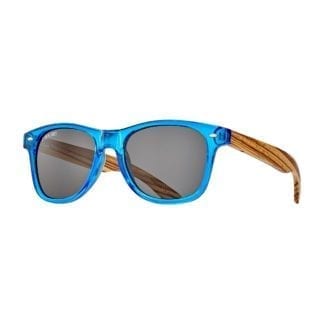 Blue Planet Eyewear sunglasses with blue translucent frames, zebra wood temples, and smoke polarized lenses; made from recycled and natural materials
