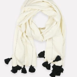 Close up photo of, loosely tied Didi scarf, handmade with soft sustainable 100% organic cotton in bone white, made by Anchal brand.