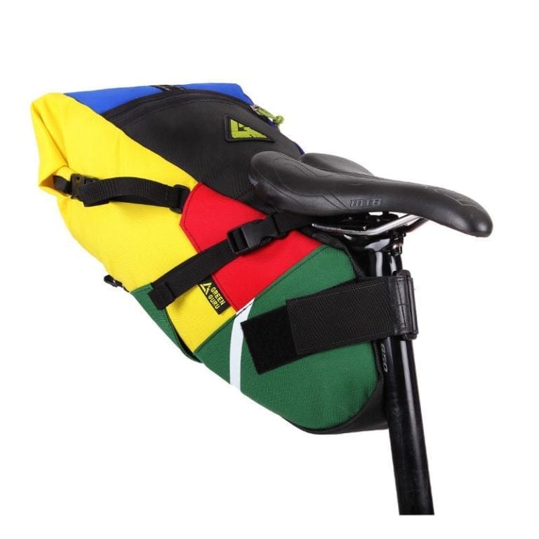 Multicolor upcycled fabric Green Guru Gear brand Haluer Seat Bag Bike Pack displayed on black seat post under black seat.