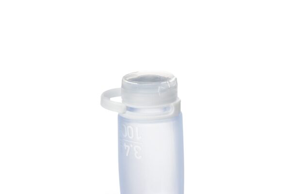 Sustainable Humangear brand squeezable 3.4 ounce food-grade blue silicone travel tube with clear cap in closed position.