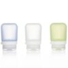 3 pack of eco friendly Humangear brand 1.7 ounce squeezable food-grade silicone travel tubes in blue, clear, and green.