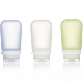 3 pack of zero waste product Humangear brand 2.5 ounce squeezable food-grade silicone travel tubes in blue, clear, and green.
