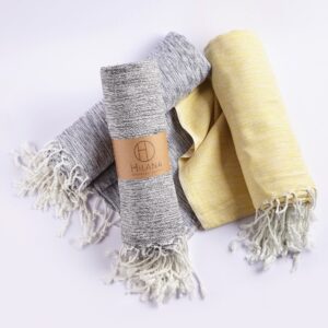Hilana brand ultra-soft, eco friendly black Yalova blanket/throw is sustainably made with regenerated cotton.
