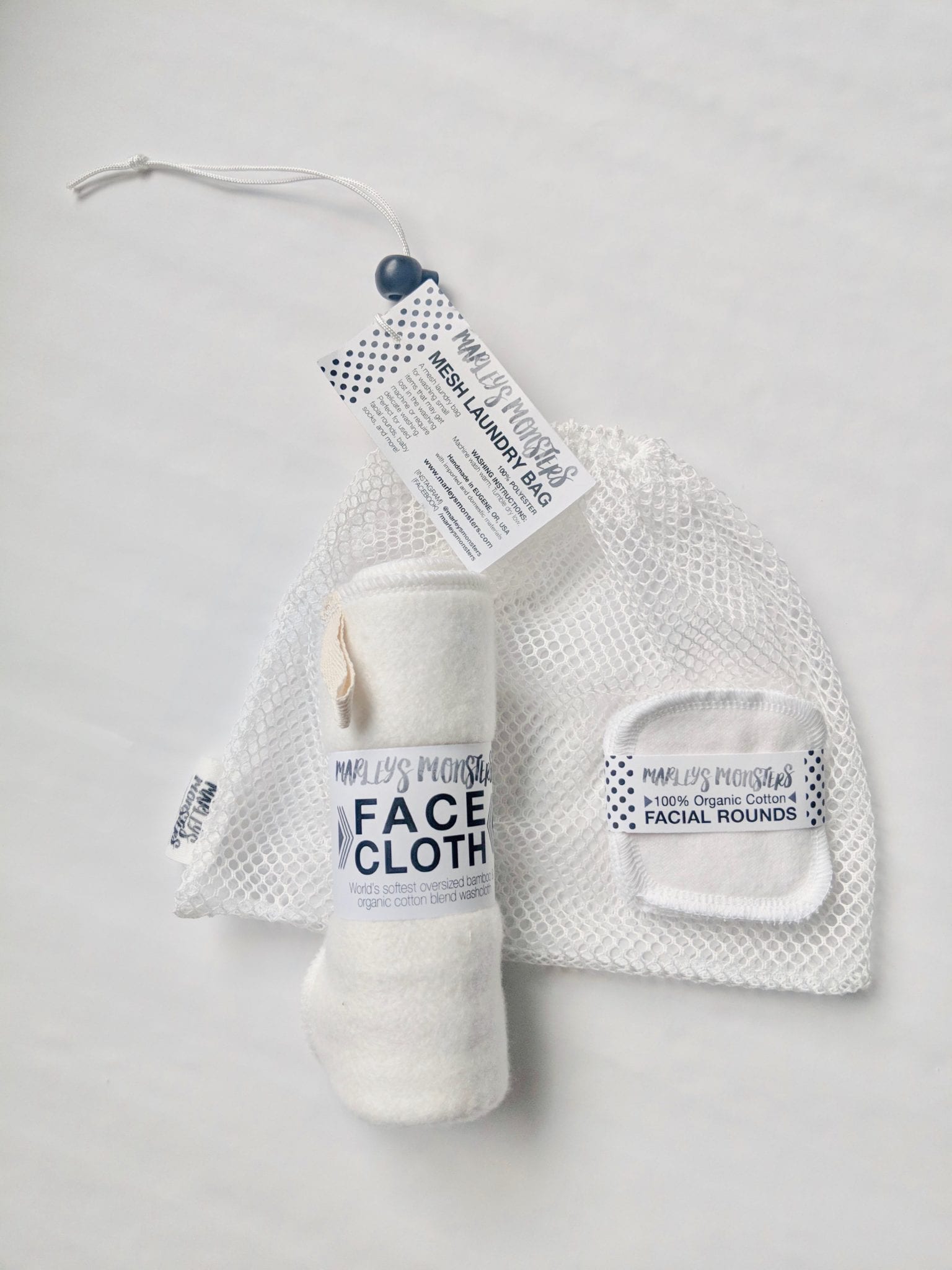 MARLEYSMONSTERS-FACEWASHINGTRAVELKIT-3PC-4 This travel kit includes Marley's Monster brand organic cotton facial rounds, a cotton and bamboo blended wash cloth, and a mesh laundry bag