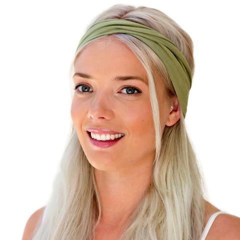 Caucasian female with long blonde hair wearing a safari green KOOSHOO brand organic cotton twist headband.