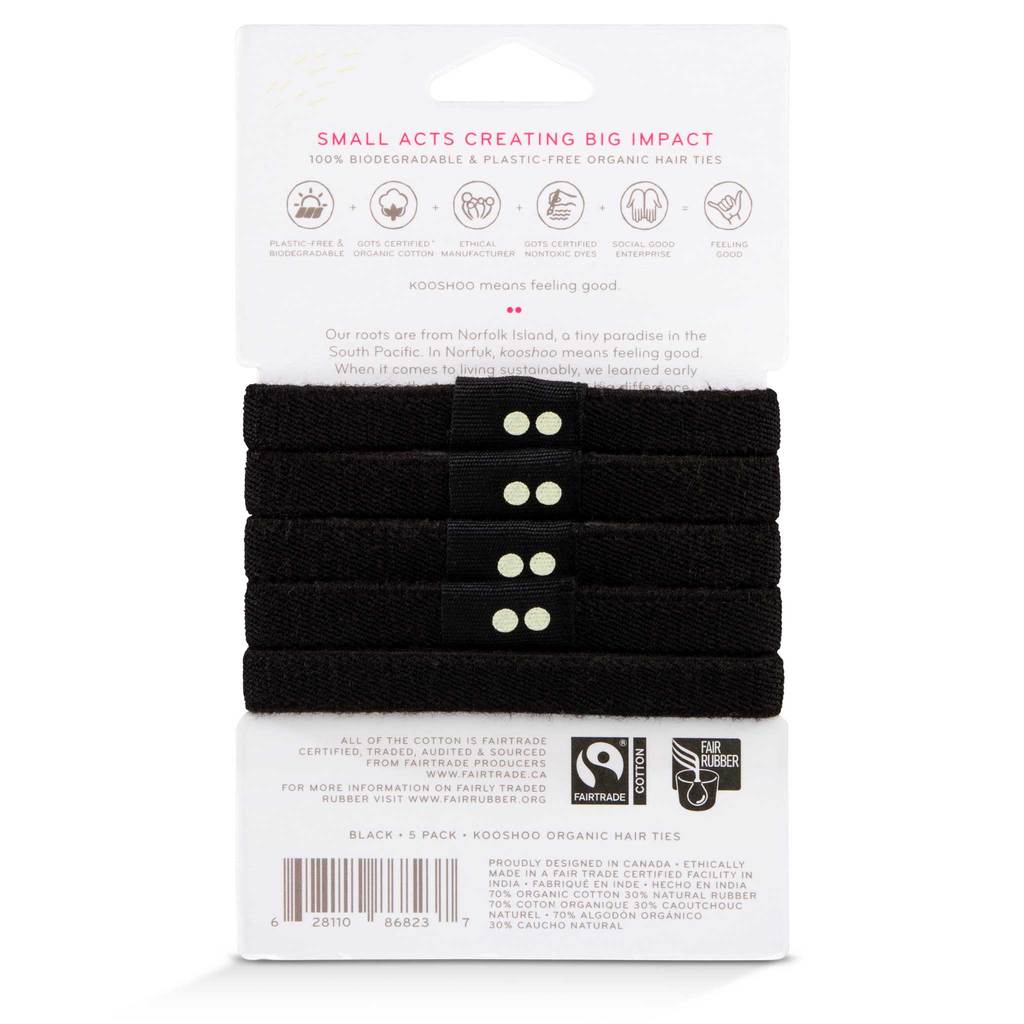 Backside of sustainable packaging for five plastic-free KOOSHOO brand black organic hair ties on a rectangular cardboard sleeve.