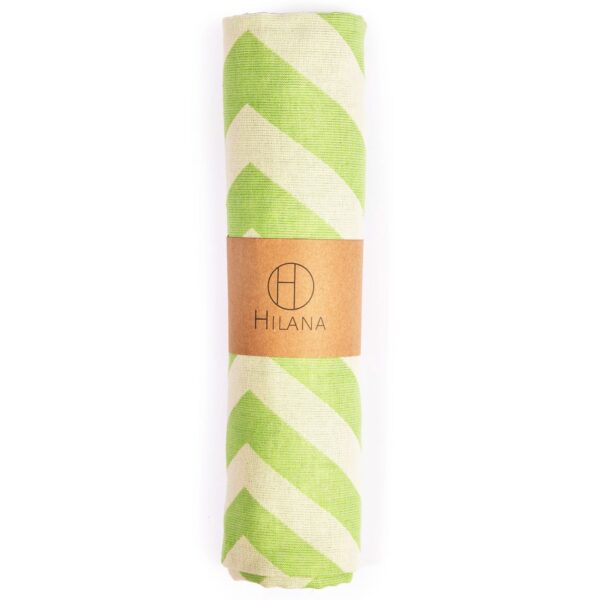 Hilana brand ultra-soft Environmentall friendly green and white chevron Mersin Towel tightly rolled with recycled paper logo.