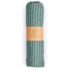 Hilana brand eco friendly green and blue striped Fethiye Towel tightly rolled with recycled paper wrap; made with environmentally friendly regenerative cotton.