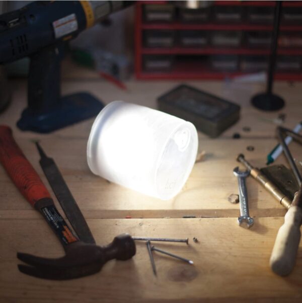 Low waste, solar powered inflatable emergency light on tool bench