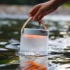 Outdoors with inflatable solar powered light in water