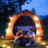 Solar string lights over tent camping