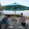 Solar string lights on patio deck umbrella