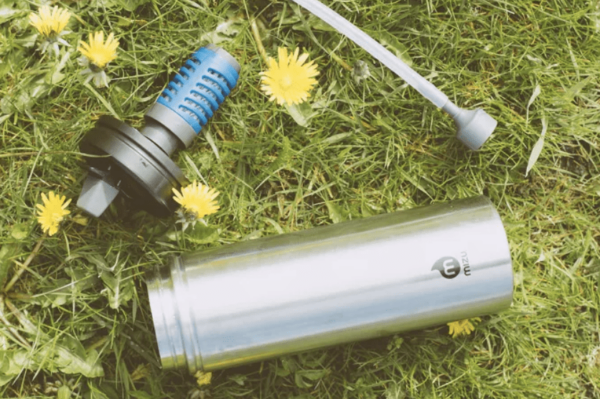 Mizu brand wide mouth stainless steel water bottle; comes with reusable straw and water purifier