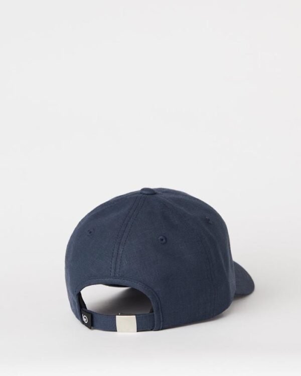 Back angle and adjustable strap of Ten Tree baseball cap in blue