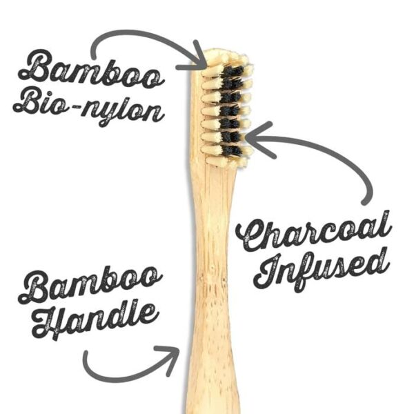 The Dirt brand environmentally friendly bamboo toothbrush with bamboo handle, charcoal infused bristles, and bamboo bio-nylon bristles.
