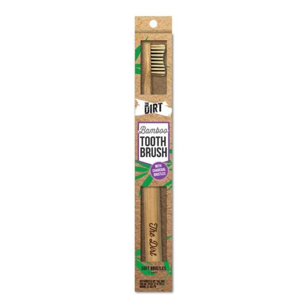 The Dirt brand eco friendly Bamboo Tooth Brush with charcoal infused soft bristles in sustainable packaging.