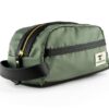 Side view of the Sword & Plough repurposed U.S. Air Force Fabric travel dopp kit in green