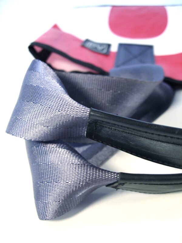 Detail showing upcycled seat belt strap on the Alchemy large tote bag