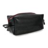 Large dopp kit by Alchemy Goods made of durable upcycled inner tubes; shown in black with red zipper.
