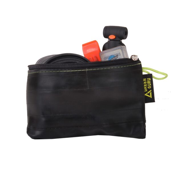 Front side view of upcycled inner tubes mid-size zipper pouch with small neon loop for clipping onto.  Pictured holding small tools and gear items with logo on tag made by eco friendly Green Guru Gear brand.