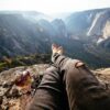 Model taking in the scenery and enjoying his Mizu brand collapsible two ounce stainless steel shot glass