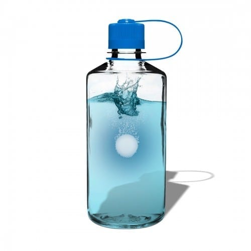 Using an eco friendly Hydrapak brand all-natural biodegradable bottle cleaning tablet to clean Nalgene water bottle.