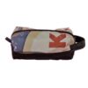 Alchemy Goods dopp kit made from upcycled advertising banners; shown in blue, red, and tan.