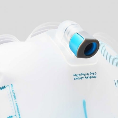 Close up display of Plug-N-Play connection port for hose on reusable Hydrapak brand shape shift 2 liter hydration reservoir.