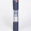 Manduka brand natural rubber 4mm yoga mat in midnight blue