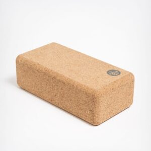 Manduka brand travel yoga block made with a lighter weight and sustainable cork material