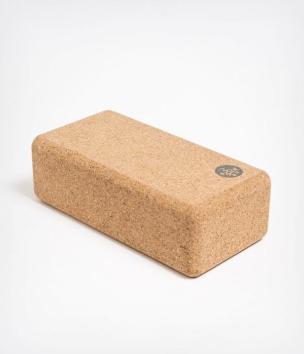 Manduka brand travel yoga block made with a lighter weight and sustainable cork material