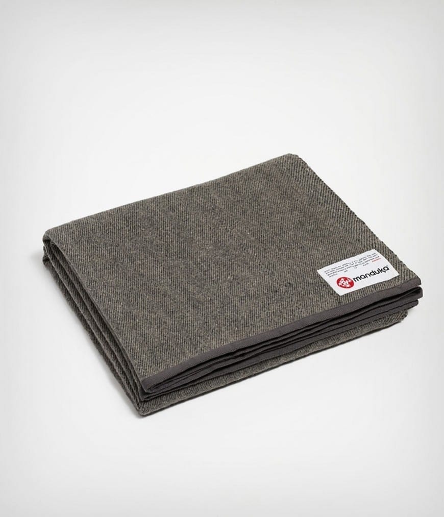 Manduka brand wool blanket in sediment gray; made with 100% recycled fibers