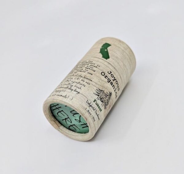 Joyous Organics brand magnesium infused organic deodorant in forest scent; comes in a biodegradable push-up cardboard tube