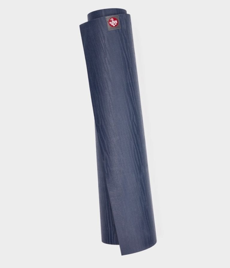 Manduka brand natural rubber 4mm yoga mat in midnight blue