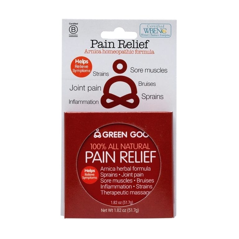 Front side of white and red recyclable packaging with symptoms listed for Green Goo brand all natural herbal arnica pain relief.  Circle cut out in packaging to show the red labeled round tin container for pain relief.