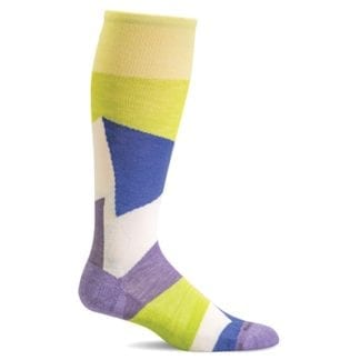 Profile display of environmentally friendly Sockwell brand Emboldened firm womens compression sock in Plum, yellow, white geometric color pattern.